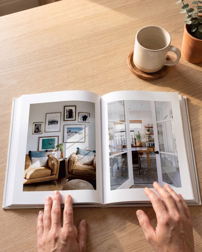 Full-bleed photography spread of finished interiors