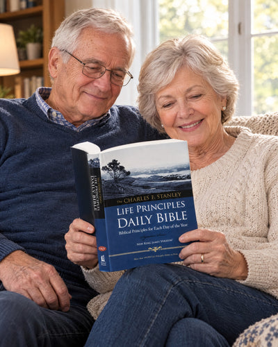 Retired couple reading the Life Principles Daily Bible NKJV together