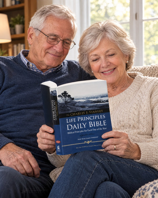 Retired couple reading the Life Principles Daily Bible NKJV together